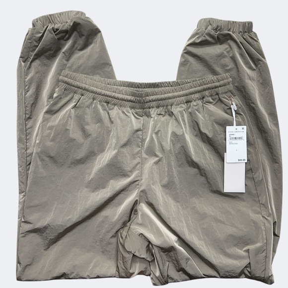 Good American Track Pants Women 2 Tan Nylon Joggers Mesh Lined Pockets Athletics - Picture 2 of 10